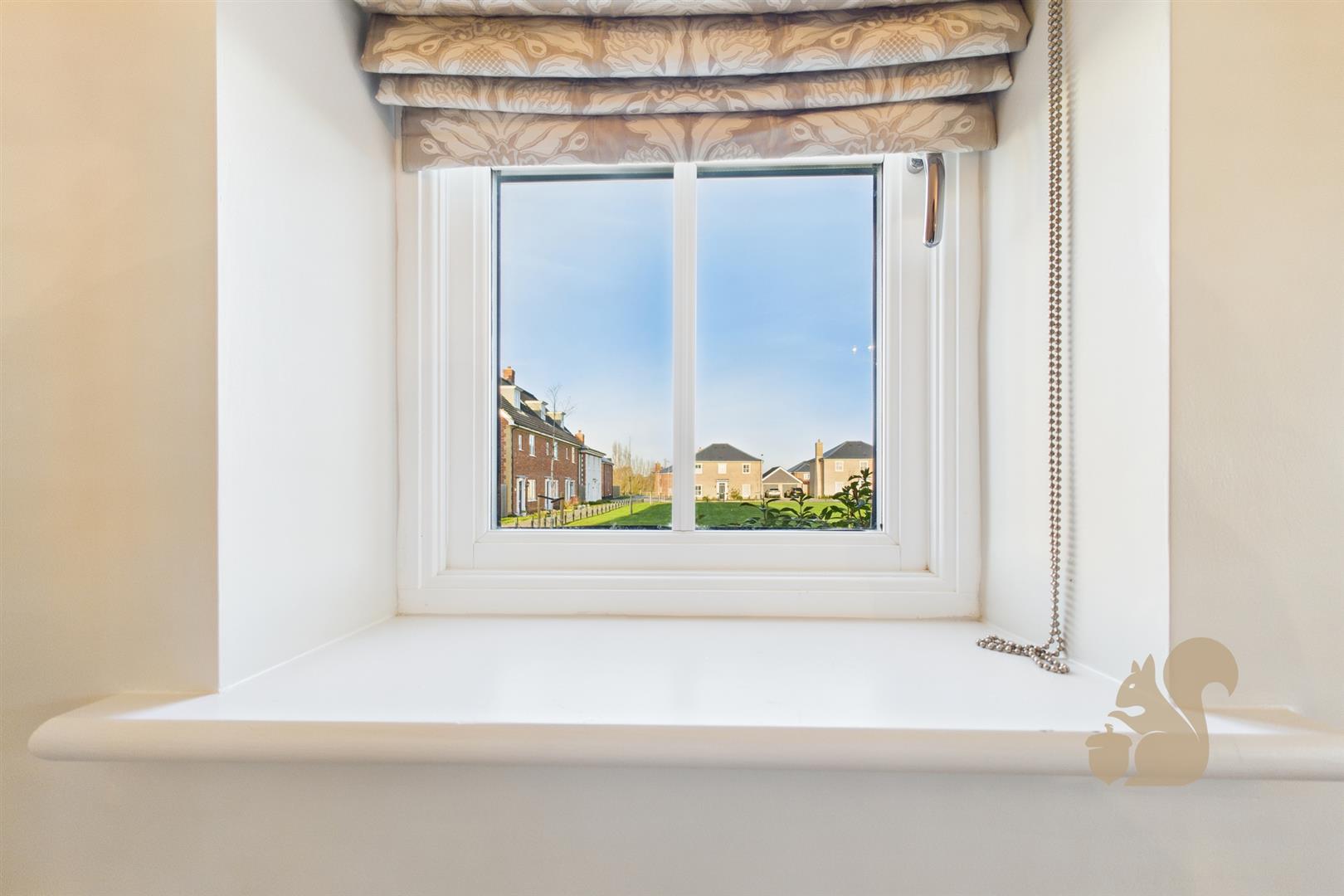 View Out To Side Of Property From Living Room